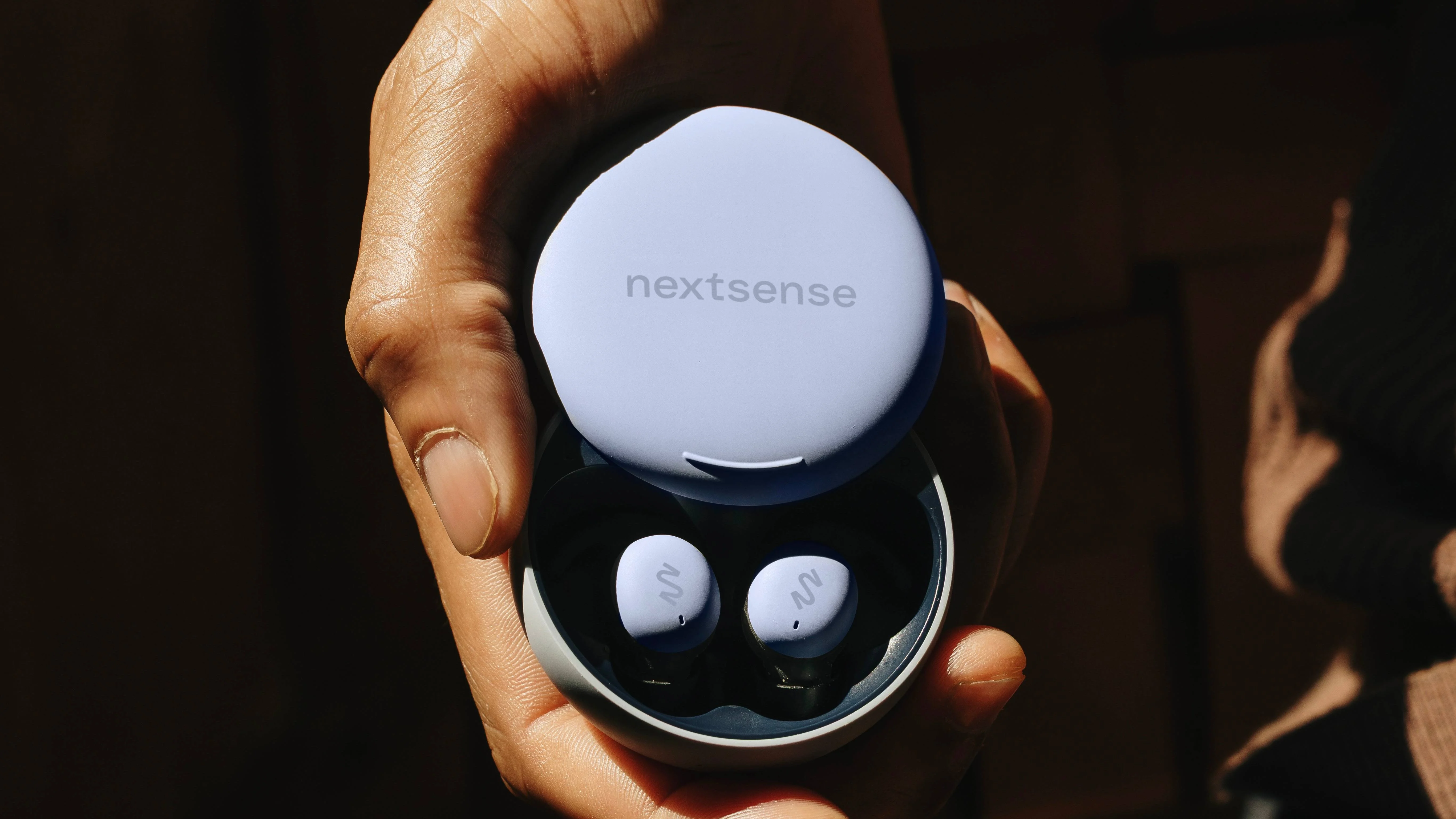 A promotional image of the NextSense Smarbuds
