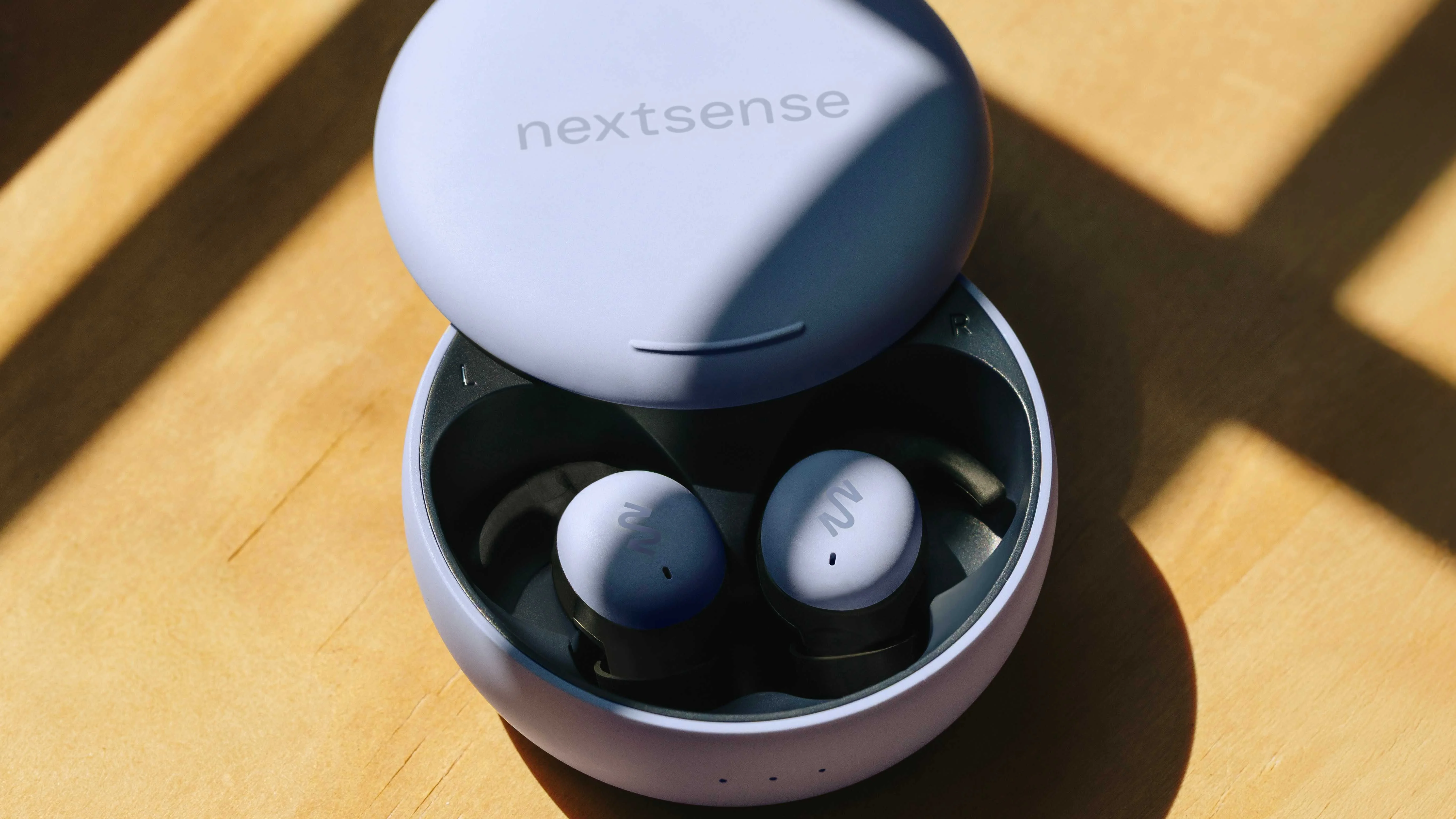 A promotional image of the NextSense Smarbuds